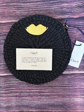 ** NEW**Clare V. Black Woven Straw Round Clutch with Gold Lips Embellishment